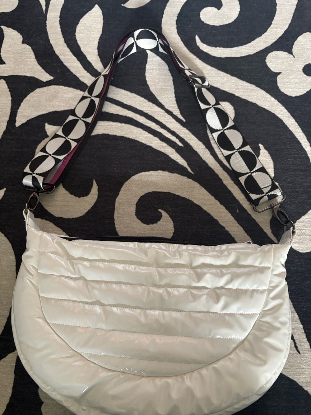 THINK ROYLN Quilted Crescent Shoulder Bag in Cream with Patterned Strap